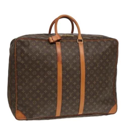 Pre-owned Canvas travel-bags Louis Vuitton Vintage , Brown , Dames