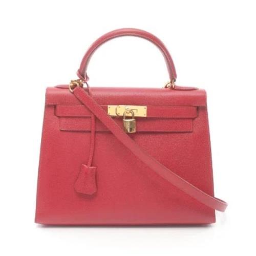 Pre-owned Leather handbags Hermès Vintage , Red , Dames