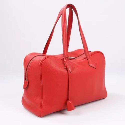 Pre-owned Leather handbags Hermès Vintage , Red , Dames