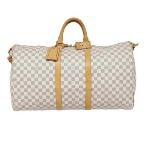 Pre-owned Canvas travel-bags Louis Vuitton Vintage , Beige , Dames