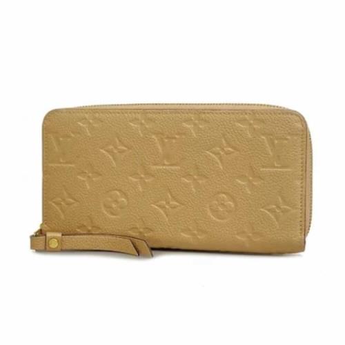 Pre-owned Fabric wallets Louis Vuitton Vintage , Beige , Dames