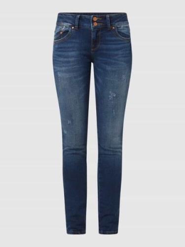 Super slim fit mid rise jeans met stretch, model 'Molly M'