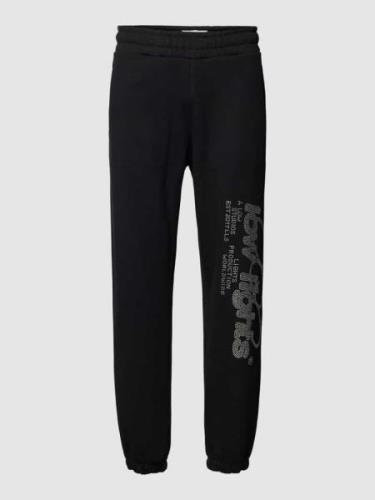 Sweatpants met label met strass-steentjes