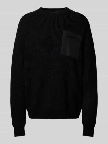 Gebreide pullover met borstzak