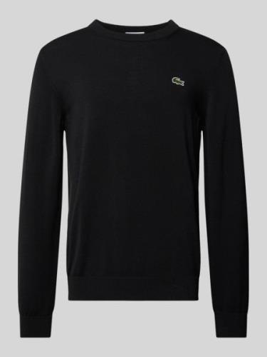 Gebreide pullover met logopatch