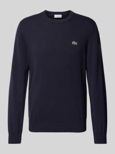 Gebreide pullover met logopatch