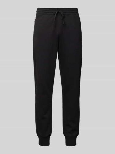 Relaxed fit sweatpants met ritszakken