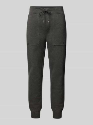 Slim fit sweatpants met opgestikte zakken