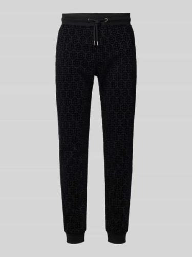 Relaxed fit sweatpants met achterzak