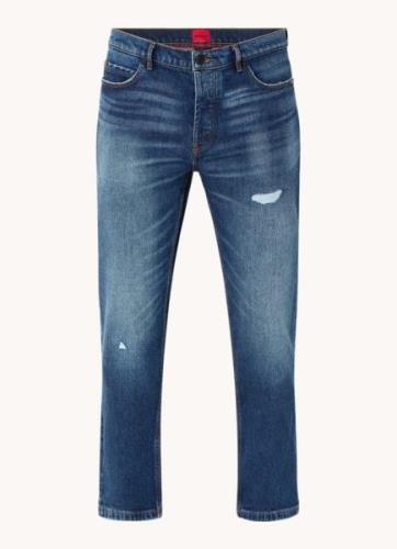 HUGO BOSS 634 tapered jeans met donkere wassing